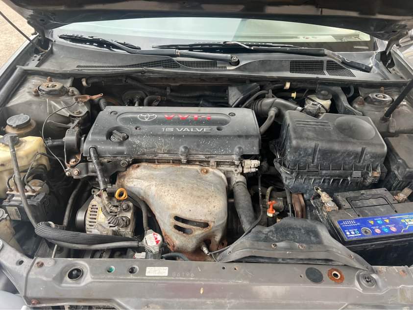 A picture of 2006 Toyota Camry pure fist body pint front bad back