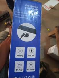 A picture of Led wireless charging Bluetooth speaker