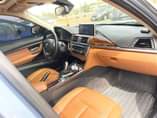 A picture of BMW 328i 2013 model Extremely clean Open sunroof Sound Engine