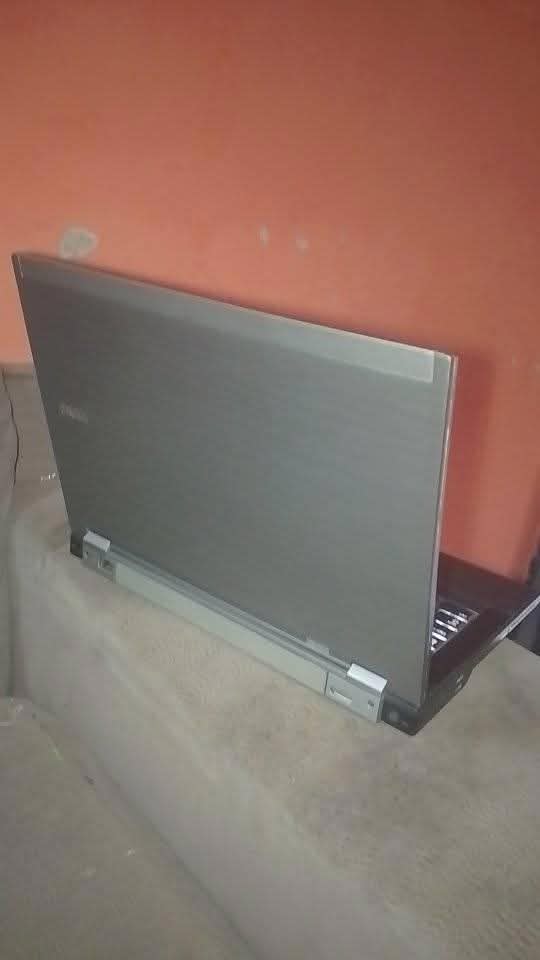 A picture of Dell latitude laptop with keyboard light