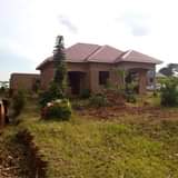 A picture of House on sale located kakelenge bajjo before bombo has 4