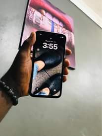 A picture of iPhone 11 plain 64gb Display Message Face ID 88 Cash
