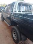 A picture of Nissan pickup on quick sale