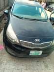A picture of Kia tapping engine and transmission and ac is work okay
