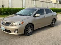 A picture of BARELY USED 2008 UPGRADED TO 2013 TOYOTA COROLLA IN ABUJA