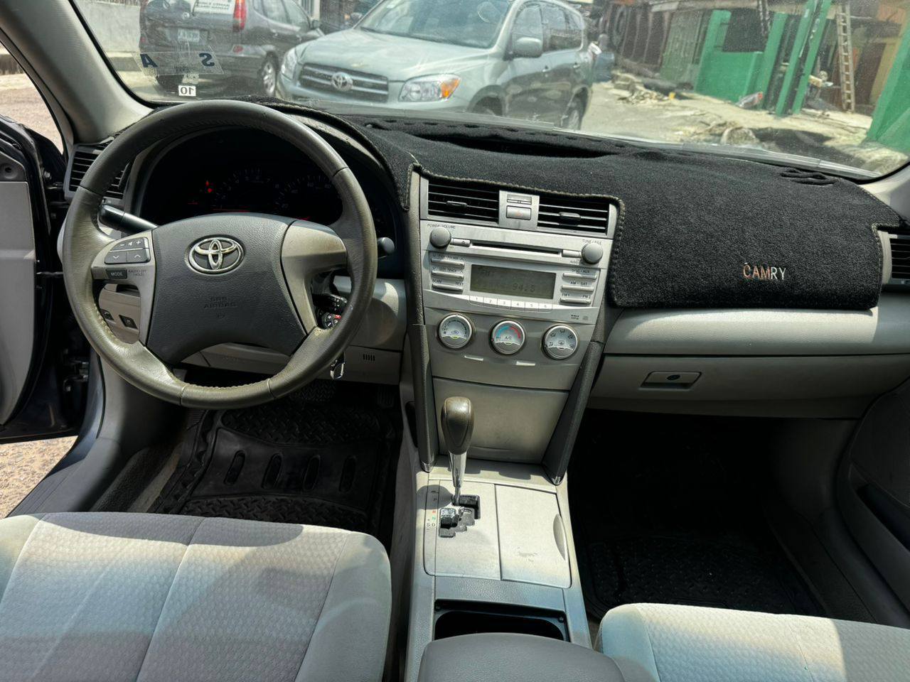 A picture of Sharp clean registered Toyota Camry 2011 model toks standard selling
