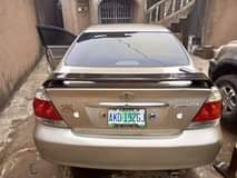 A picture of 2005 Toyota Camry 05 LE 4 plug 07063645952