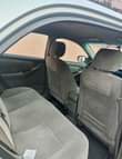 A picture of The owner of this 2004 toyota corolla sports 1st body