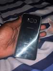 A picture of S8 price 170k got problem with screen storage 128 0709766746