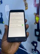 A picture of iPhone 7plus 32gb Working fingerprint 100 battery health At 580
