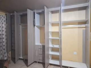 A picture of 8 doors wardrobe with TV space 
