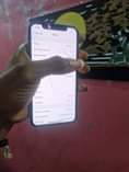A picture of Iphone X 64gb all features working fine but has crack