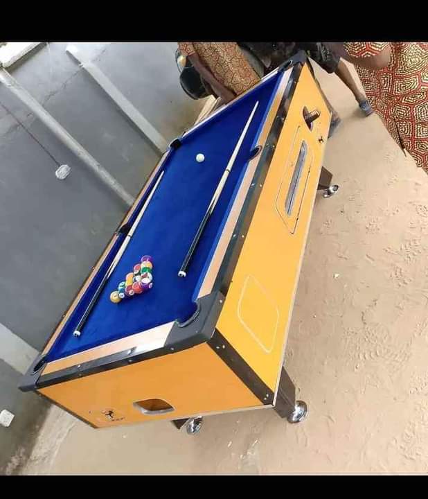A picture of Snooker board with full accessories