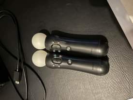 A picture of PS4 1tb with 2 controllers with VR plus 10 games