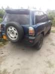 A picture of Rav4 nauza 4 mil gari nzuri safari popote engine haijaguswa