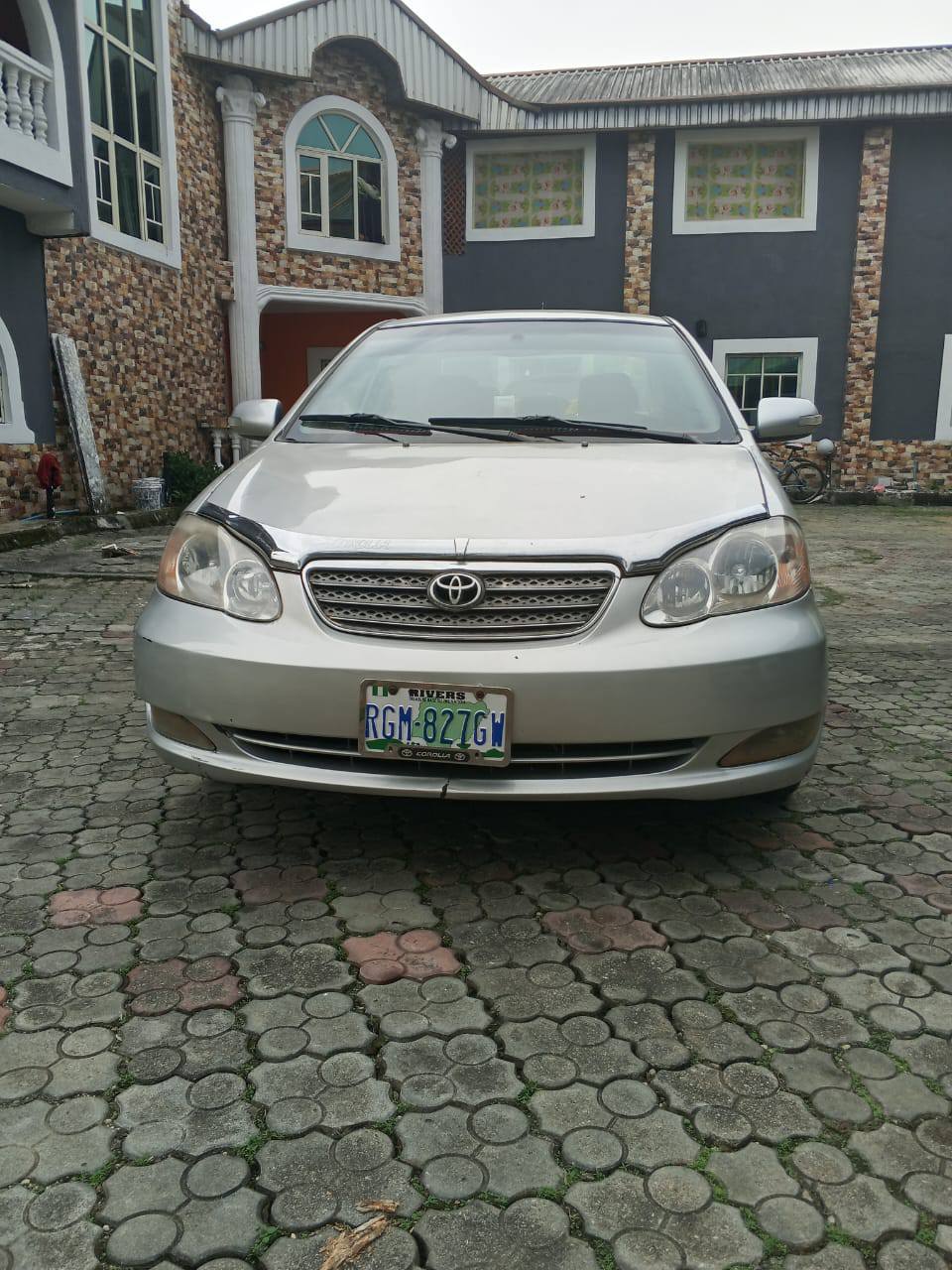 A picture of Toyota Corolla 2004 model Sound v4 engine gear AC chilling