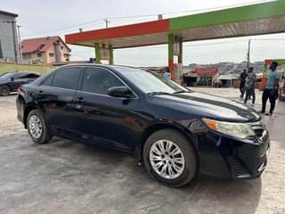 A picture of Reg Toyota Camry 2014 LE First Body Pan Clean Fabrics