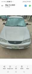 A picture of Toyota Corolla year 2002 engine and transmission and ac is