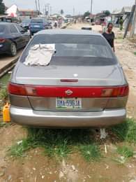 A picture of Nissan sunny 2004 model Painted on first body Engine 100