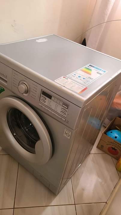 A picture of LG FRONT LOAD WASHING MACHINE 8KGS