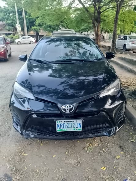 A picture of 2015 Toyota Corolla clean sharp Nigerian use buy and drive