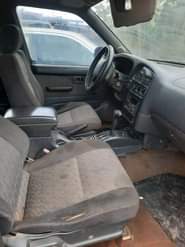 A picture of Nissan Pathfinder is available with good condition engine and gear
