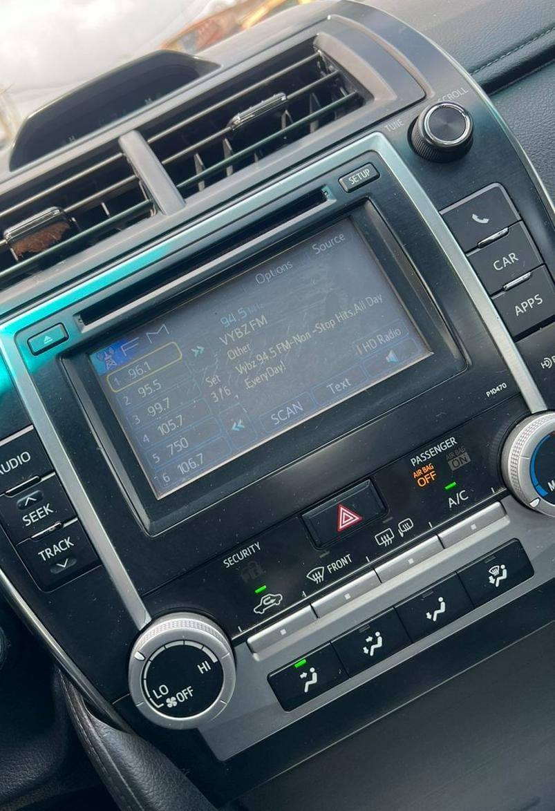 A picture of URGENT SALES 2 MONTHS REGISTERED 2013 Toyota Camry LE 4plugs