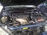 A picture of Toyota Camry 2004 4 plug Engine Ac Gear Good condition