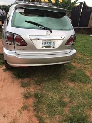 A picture of Lexus Rx300 2002 Baked on first body pan Neatly used