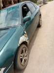 A picture of Toyota Corolla Lift back Manual gear Engine smokes Little Good