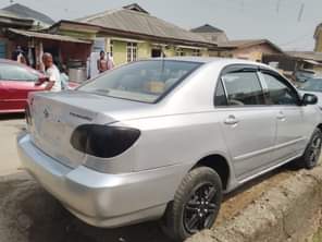 A picture of Registered 04 Toyota corolla painted on first body engine and