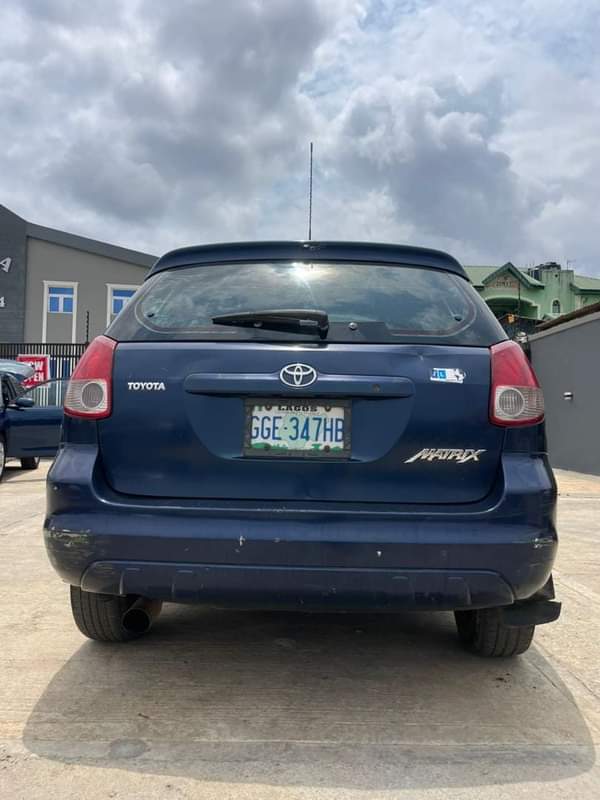 A picture of BRIEFLY USED 2004 TOYOTA MATRIX CAR CAME IN LATE 2021