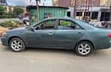 A picture of 2004 camry Ac is not good Body needs painting Engine