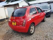 A picture of Nissan march 5 5M ipo mwanza