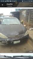 A picture of 2006 Toyota Camry painted on first body engine and gear