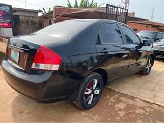 A picture of Reg Kia Cerato 2008 model owner need money extremely clean