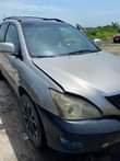 A picture of Lexus Rx 330 Ac and engine needs attention