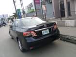 A picture of 6 months used 2011 Toyota corolla Neatly used with everything
