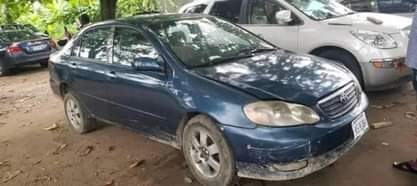 A picture of Toyota Corolla 2006 engine and gear is ok AC is