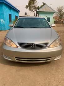 A picture of FIRST BODY UNREGISTERED UNTEMPERED ENGINE 2004 TOYOTA CAMRY IN A