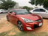 A picture of SUPER CLEAN 2013 VELOSTER PRICE 3 5M CALL 08103066746 LOCATION