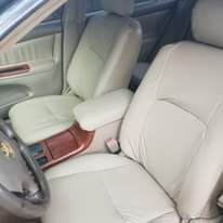 A picture of SUPER CLEAN TOYOTA CAMRY BIG DADDY Very neat interior Engine