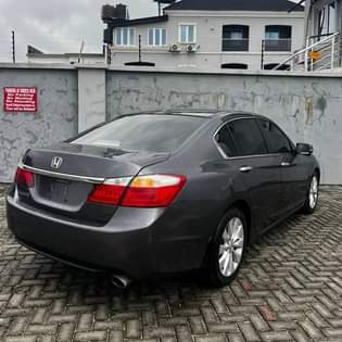 A picture of Few months registered 2015 Honda Accord Pure first body Tokunbo
