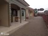 A picture of FOUR HOUSES ON QUICK SALE Located in kawanda Along bombo