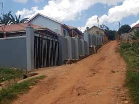 A picture of Plot for sale location Kawanda on main rd wakola residential