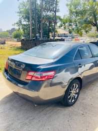 A picture of IN GOD WE TRUST 3 Months used 2010 Camry Spider