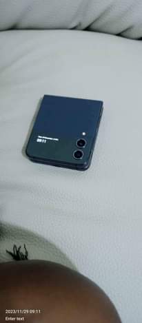 A picture of Samsung Z flip 4 Storage 256 call WhatsApp 0755148172