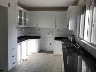 A picture of Mahogany doors wardrobes and kitchen cabinets