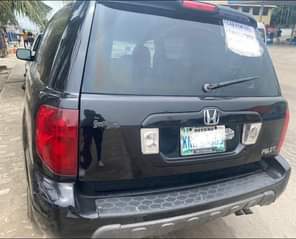 A picture of KB AUTOs Honda Pilot YEAR 2004 model Three seaters My