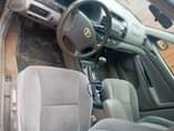 A picture of Nigeria used Toyota Corolla engine is smoking gear is neat